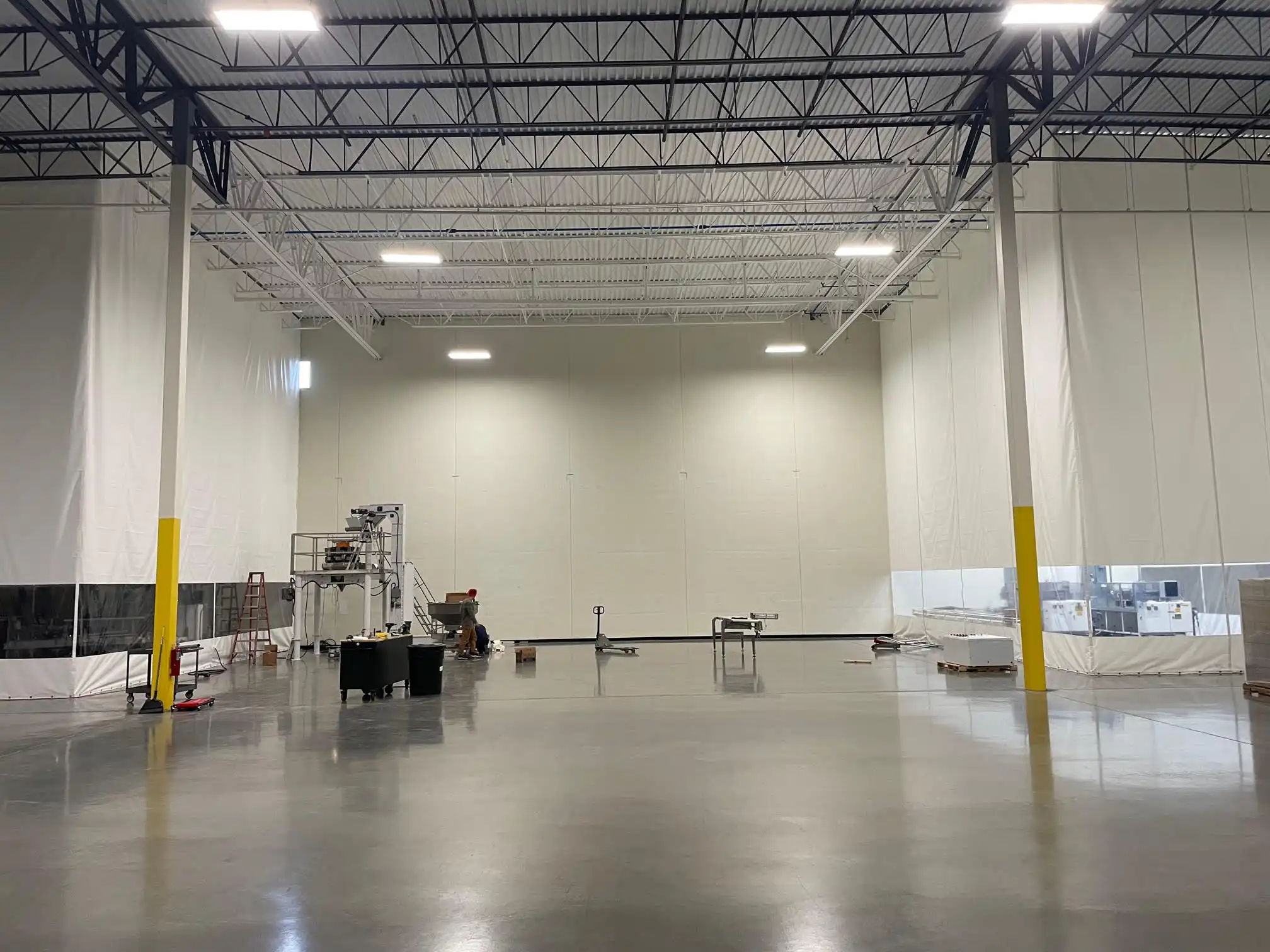 Warehouse enclosure with vision panels